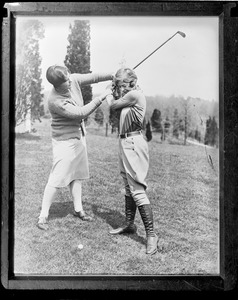 Helen Hicks instructing 17 year old aviatrix Elinor White on her swing. Farmingdale, N.Y.