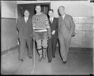 Group photo with one Rangers player. Frank Patrick, Lynn Patrick, unknown, Lester Patrick.