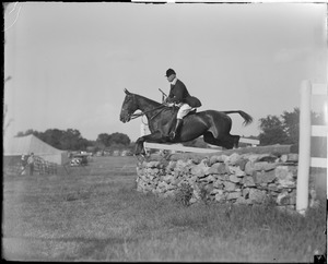 George Timmins of the Groton Hunt jumping