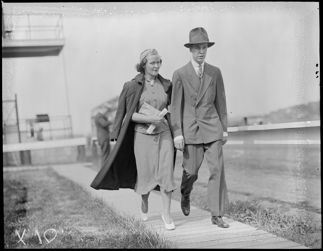 Unidentified couple at Suffolk Downs - see program