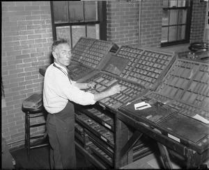 Clarence DeMar in his print shop.