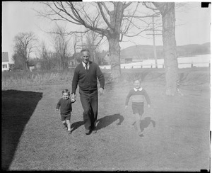 Clarence DeMar with two sons.