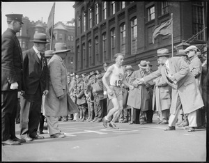 Joie Ray, the famous miler, coming in third in the B.A.A. marathon. He collapsed at the end with blistered feet, time 2 hours, 41 minutes, 56 4/5 seconds