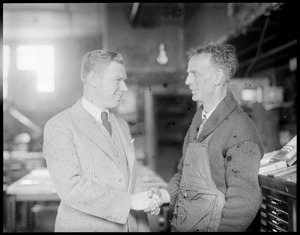 Charley Paddock, the star sprinter of the age, calls on Clarence DeMar at his printing office in Jamaica Plain