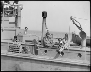 Lill and Tootsie watch yacht race off Marblehead from aboard Coast Guard boat