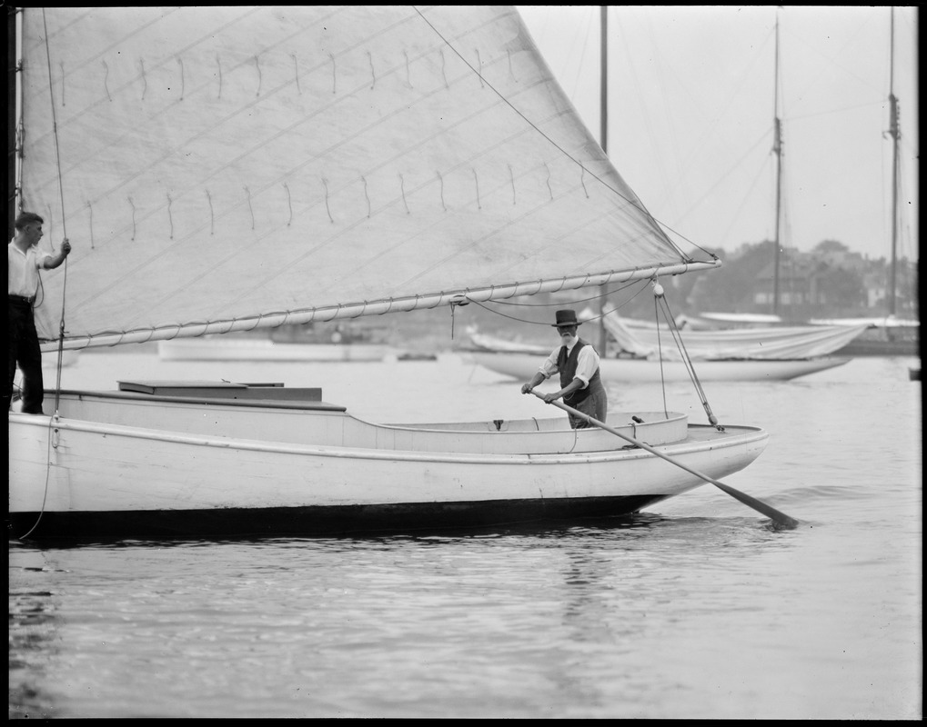 Yachting off Marblehead, 87 year old Marblehead skipper, Capt. Von Caswell with his 50 year old sloop - Gypsy