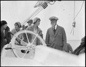 Miss Farrell and Capt. Louis Thebaud on board the fishing schooner Gertrude L. Thebaud at Gloucester