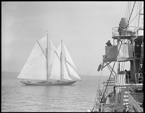 Columbia passing stake boat off Gloucester