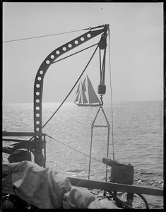 Fishing schooner racing off Gloucester from deck of Destroyer USS Sturtevant