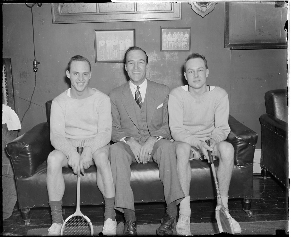 Members of squash team in club house