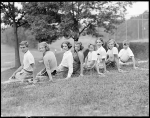 Young players pose on lawn