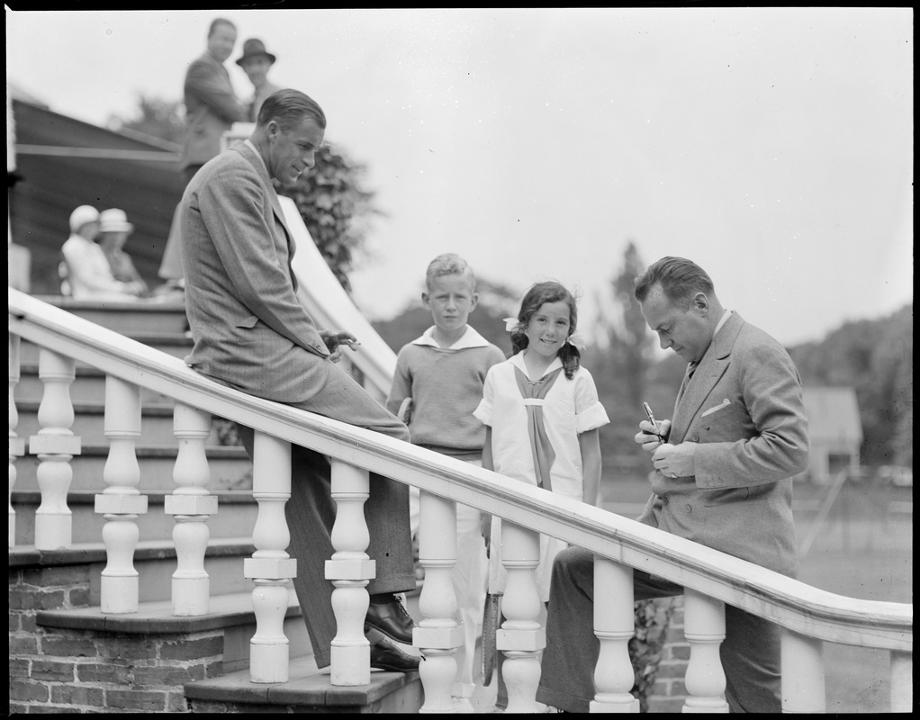 Bill Tilden and Francis Hunter signing tennis balls for young players, Longwood Court