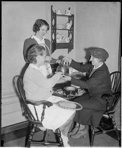 Lady players having tea