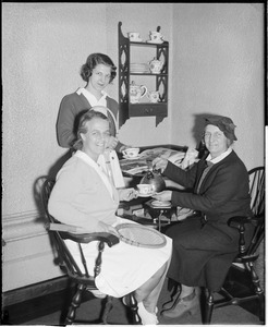 Lady players having tea