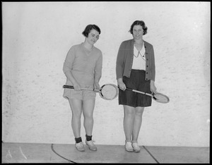 Unidentified 2 women with tennis rackets