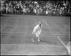 Helen Wills, tennis star in action