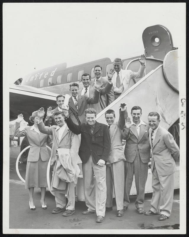 Tufts Baseball Squad flier to Omaha-The Jumbos left Boston airport this morning aboard a United Air Lines [lane to represent New England in de NCCA tournament. On ground. left to right: Stewardess Elinor Armstrong, partially hidden by Rudy Fobert's upraised arm, Bill Burns, All Bennet, John Panagos, Coach John Ricker. On steps: Ace Pitcher Bud Niles, Capt. George Minot, Jr., Jim Jabbour, John Lowe and Ed Schluntz.