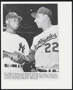 Starting Pitchers--Al Downing, 22-year-old left-hander of the New York Yankees, left, and Johnny Podres, left-hander of the Los Angeles Dodgers, shake hands at New York’s Yankee Stadium today before the start of the second game of the 1963 World Series.