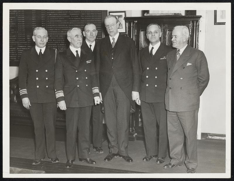 Mayor Frederick W. Mansfield pays a courtesy visit to the Navy Yard. Left to right: Comdr. H.G. Patrick, aide to the admiral; Admiral Henry H. Hough, commandant; Capt. H.E. Cooke, captain of the yard; Mayor Mansfield; Capt. J.B. Gay, chief of staff, and Joseph Mellyn, secretary of the mayor.