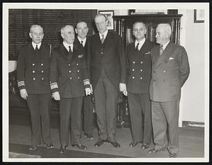 Mayor Frederick W. Mansfield pays a courtesy visit to the Navy Yard. Left to right: Comdr. H.G. Patrick, aide to the admiral; Admiral Henry H. Hough, commandant; Capt. H.E. Cooke, captain of the yard; Mayor Mansfield; Capt. J.B. Gay, chief of staff, and Joseph Mellyn, secretary of the mayor.
