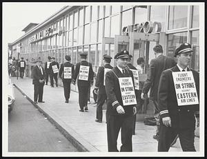 Flight engineers on strike picketing in front of Eastern Air Line Gate 20