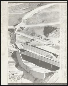 The 2/9 earthquake effectively closed the inland main highway from Los Angeles to San Francisco, as freeway overpass collapsed, blocking off Interstate 5 and Highway 14. Thirty-two persons were known dead, and authorities feared the final death toll might reach close to 100. Nearly 900 were injured, and the property damage ran into the millions of dollars.