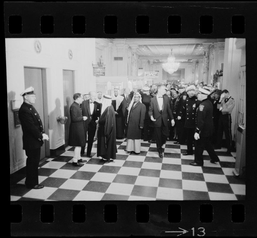 Crowded hallway filled with guests for the King Saud reception