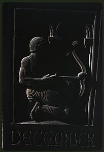 Relief sculpture of man with bow representing month of December, Salmon Tower Building, Manhattan, New York