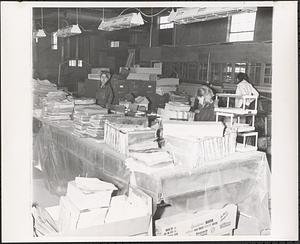 Files and papers on tables after flood