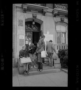 People, probably Emerson students, stand in front of 96 Beacon, Boston