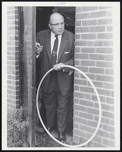 Don Carr, manager, F.W. Woolworth, Wollaston Branch, President Wollaston Businessmens’ Association, with hula hoop