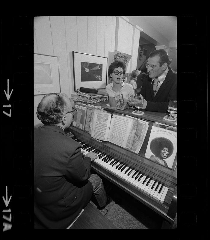 Pianist at party, Beacon Hill Digital Commonwealth