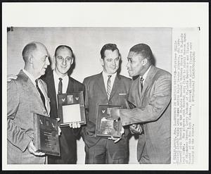 Honored by Baseball Writers--Oldtimer Willie Sherdel (left) talks with three active Major league players, who were honored with Sherdel at the St.Louis Baseball Writers dinner in St.Louis last night. The players with Sherdel are; (left to right) Warren Spahn of Milwaukee Braves, Larry Jackson of St.Louis Cardinals and Elston Howard of the New York Yankees. Several other sports figures were honored at the dinner.