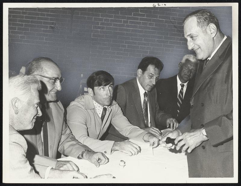 The Wonder of It - Aaron Kulchinsky, trainer, right, draws first and second post position for Wonderland Derby. Looking on, from left, Dr. Paul F. Walsh, chairman of the Racing Commission: Franklin J. Nolan; Andrew Fita, racing secretary; Herbert Brenner, presiding judge; and Edward Gallagher, president of Wonderland Park.