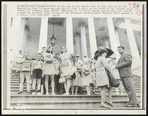 On the eve of the Senate vote on ABM, members of the Washington Area Citizens Against the ABM hold a vigil on the steps of the Capitol 8/5. Inside the chamber, Sen. Edward M. Kennedy, in his first Senate speech since his tragic automobile accident 7/18, denounced the Safeguard Antiballistic Missile (ABM) system as a folly.