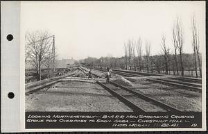 Views of Dane Property, Chestnut Hill Site, Newton Cemetery Site, Boston College Site, looking northeasterly, Boston Albany Railroad men spreading crushed stone for overpass to spoil area, Chestnut Hill, Brookline, Mass., Nov. 22, 1941