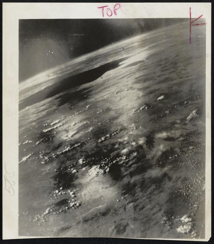 100 Miles Away from a V-2 rocket the earth looks like this. The picture made by an automatic camera over White Sands, N.M., shows 200,000 square miles of the United States and Mexico.