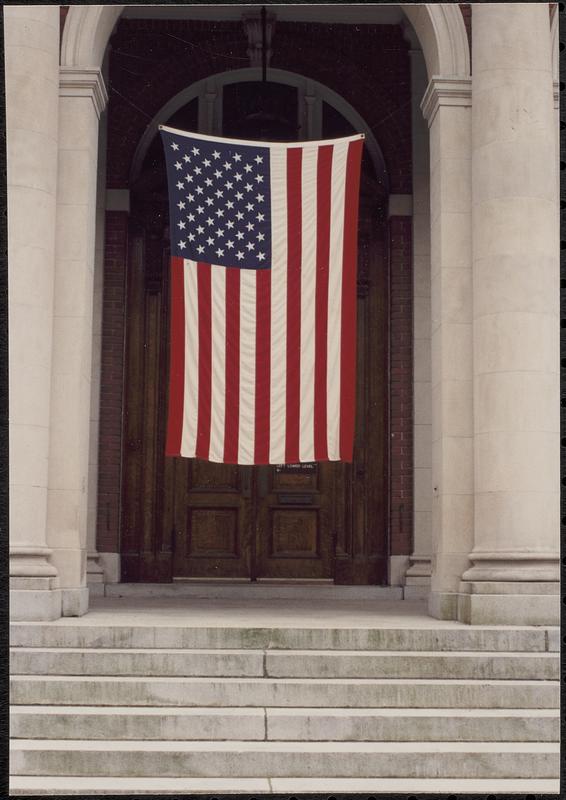 American flag at entrance to Lawrence Library