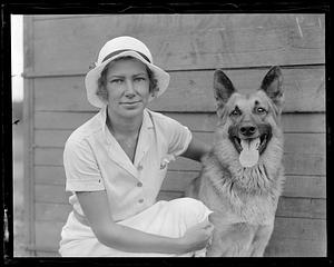 A woman with a dog