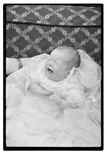 Unidentified baby, possibly in a christening gown