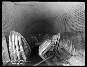 Wachusett Aqueduct, finished brick lining in east 4, Section 3, station 89, from the west (interior), West Berlin, Berlin, Mass., Apr. 12, 1897