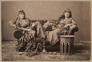 Studio portrait of two women in traditional Turkish dress