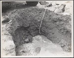 Trench shot starting to show sandy material