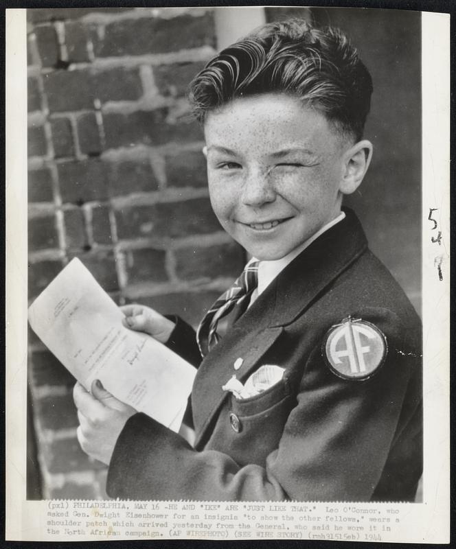 He and "Ike" Are "Just Like That." Leo O'Conner, who asked Gen Dwight Eisenhower for an insignia "to show the other fellows," wears a shoulder patch which arrived yesterday from the General, who said he wore it in the North African campaign.