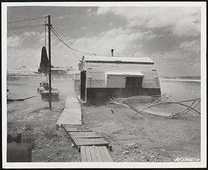 Pre-Typhoon Winds Kick Up Coral Dust As a typhoon approaches Okinawa, gusts kick up clouds of coral dust on a U. S. Air Force B-29 hardstand. By this time, typhoon readiness is at a peak among the men and equipment on the island, an installations and aircraft are battened down.