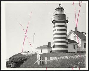 Lighthouse at west Quoddy Head eastern most point in the U. S. A.