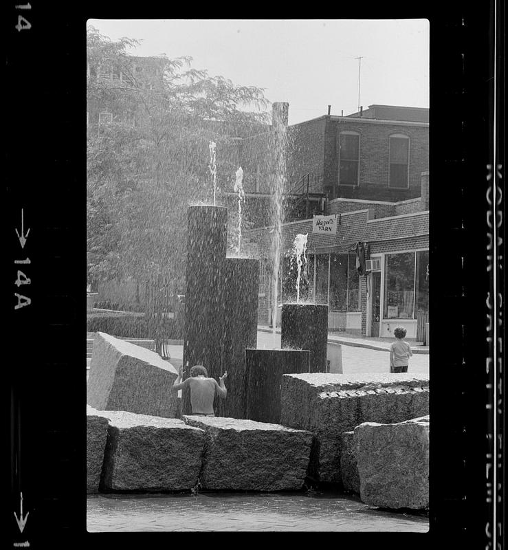 Boy and fountain Inn Street