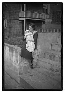 Mercedes Pasarell Sanromá holding a baby