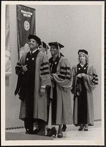 Dr. Janet Jemmott Moses, center, and others at graduation