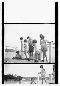 Group portraits near pond or beach